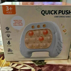 Quick push game console series NWOT